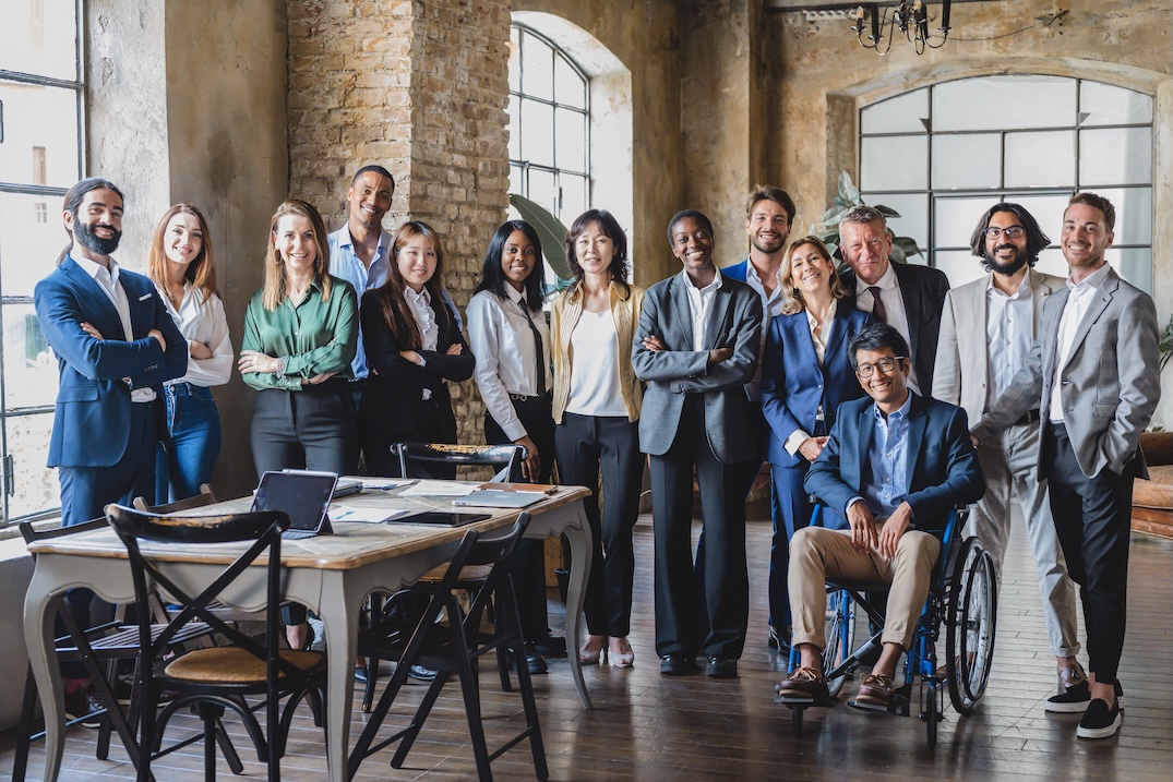 A diverse group of man and women in business attire